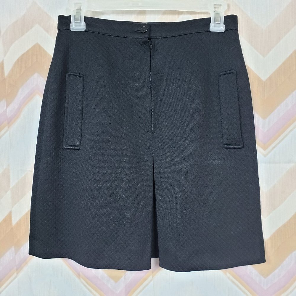 Black textured front pleated A-line skirt
